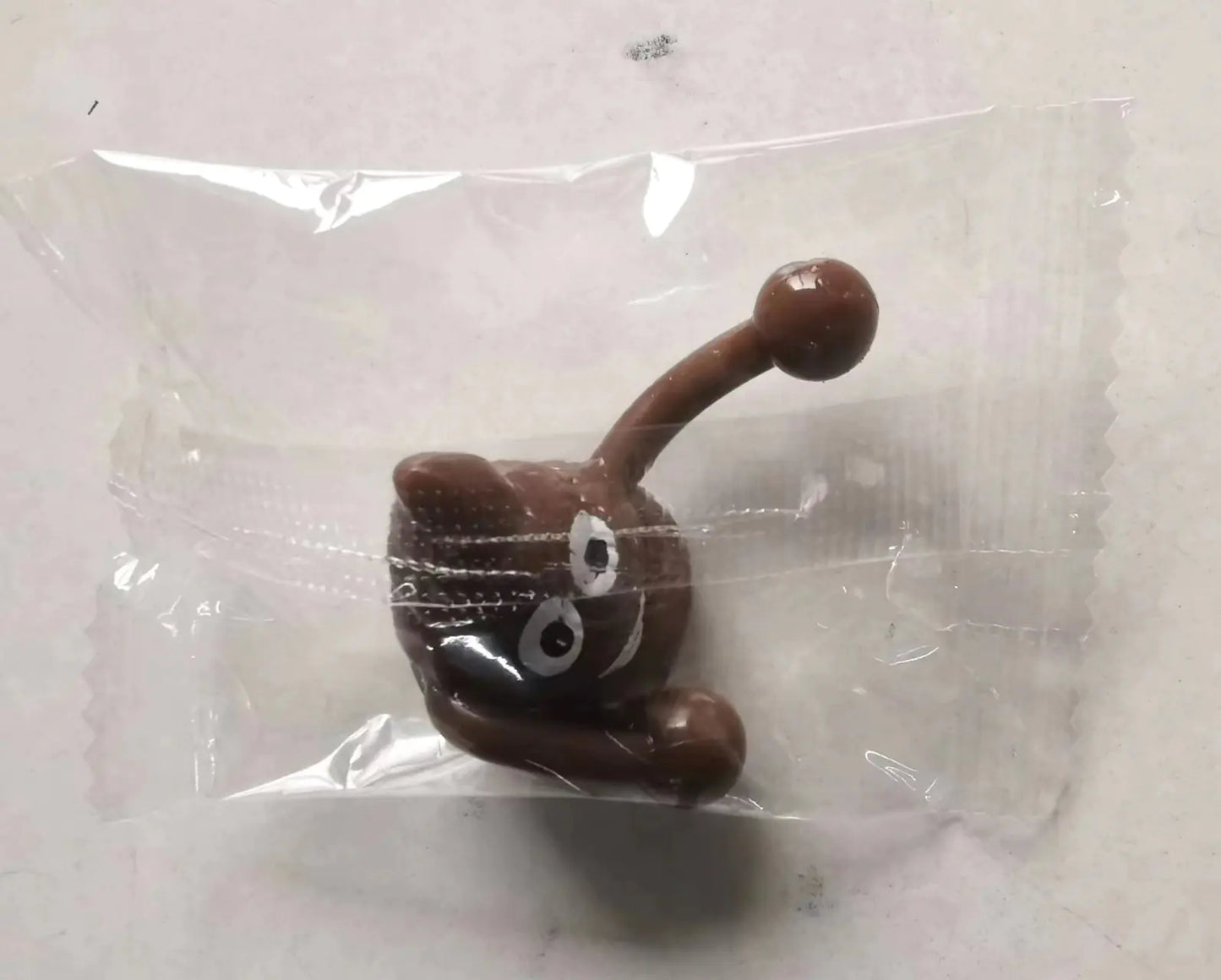 Funny Poop Slingshot Toy – Stretch & Launch Fun